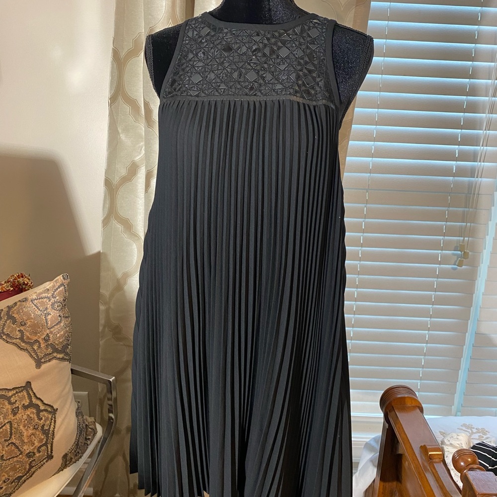 Trina Turk black sleeveless black dress. Size 6